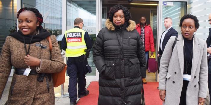 Former Defense CS Monica Juma (M) is received by June Ruto (R) in Warsaw in February 2019.