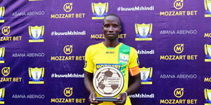 Kakamega Homeboyz midfielder Moses Mudavadi feted with a customized trophy after being named the club's February player of the month.