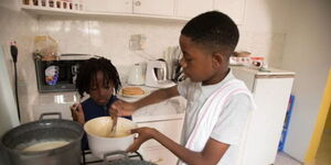 13-year-old Kenyan chef Alvin Keffer in the kitchen.