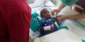 Baby Baraka in hospital after undergoing a liver transplant in India
