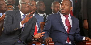 Former Nairobi governor Mike Sonko and Polycarp Igathe during their swearing-in at Uhuru Park on August 21, 2017.