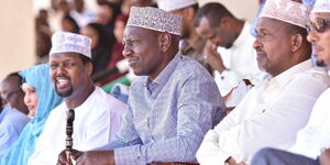 Deputy President William Ruto (centre) with Mandera County Governor Ali Roba(left) at a past event