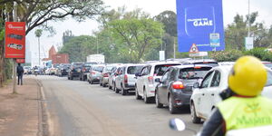 Vehicles in traffic along Uhuru Highway in Nairobi, Kenya.
