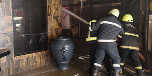 Nairobi fire brigade putting out an inferno 20th Century Plaza in March 2019