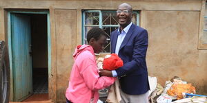 Yvonne Barasa (left) alongside Bungoma Governor Wycliffe Wangamati. 