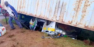 A trailer overturns on a 14-seater matatu along the Webuye-Eldoret highway on July 3, 2022. 