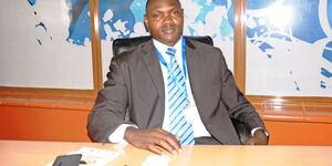 Juma Nyongesa a former security guard is now the Principal at the Kenya Institute of Development Studies