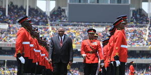President Uhuru Kenyatta inspects a full parade mounted by the Kenya Defence Forces at Kasarani Stadium on September 13, 2022.