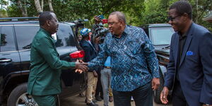 Former Prime Minister Raila Odinga greeting Former President Uhuru Kenyatta at the Stephen Kalonzo Command Centre in Karen on July 28 2023.