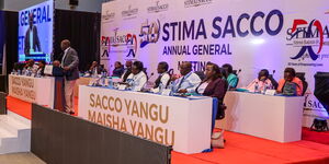 Cooperatives CS Simon Chelugui addressing members at the Stima Sacco AGM on March 23, 2024.