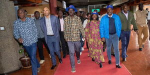 Raila Odinga walking out from KICC flanked by other Azimio One Kenya Coalition leaders  after addressing the Media on August 16, 2022