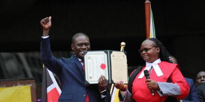 Nairobi County Governor Johnson Sakaja holding his oath of office official document at KICC on August 24, 2022