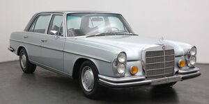 A Mercedes Benz 300SEL in a showroom