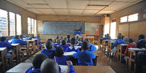 Children learning in a classroom setting.