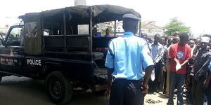 A Kenyan Police Officer pictured at a crime scene.