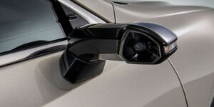 A file image of a car using a camera instead of a side mirror.