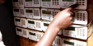 Undated image of a customer keying in tokens in a prepaid electric meter.