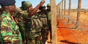 A file photo of former Inspector General of Police Joseph Boinnet at the site of the Kenya-Somalia security wall.