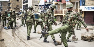 A file photo of police officers at a past operation