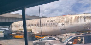 A jet fuselage stuck at City Cabanas overpass along Mombasa Road on Sunday, February 6, 2022.