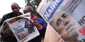A man reading a newspaper
