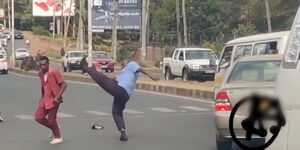 A matatu driver attempting to kick the conductor on Tuesday, January 24, 2023