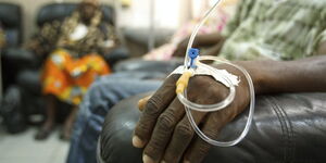 A patient connected to a medical drip 