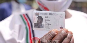 A person holding the new Huduma Namba Card unveiled on Tuesday, October 20, 2020.