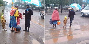 A photo of a police officer assisting a woman in town