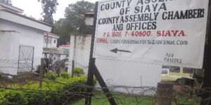 A signpost indicating Siaya County Assembly