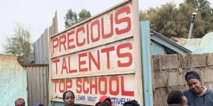 A signpost of Precious Talents school.
