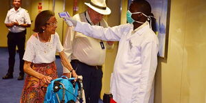 A tourist is screened for Coronavirus at the Port of Mombasa on February 13, 2020