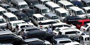 A photo of vehicles at a yard awaiting auction in Mombasa County in 2019.