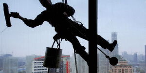 A window cleaner at work.