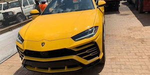 A yellow Lamborghini Urus.