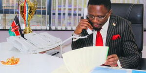 CS Ababu Namwamba speaks to FIFA on phone