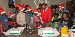 Former president Uhuru Kenyatta during a visit to Children’s Garden Home and School in Uthiru, Mama Fatuma Goodwill Children’s Home and Gatundu Children’s Home on Friday December 23, 2022