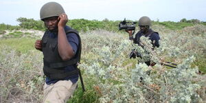 Investigative journalist John Allan Namu(left) and Journalist James Japicha Black(right) during a documentary -shooting on February 21, 2013