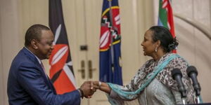 Former President Uhuru Kenyatta and former Foreign Affairs Cabinet Secretary Amb. Amina Mohamed at a past event.