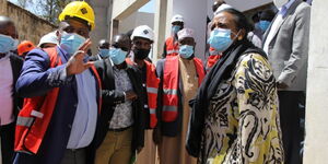 Sports CS Amina Mohamed inspecting the ongoing construction of the Kipchoge Keino stadium.