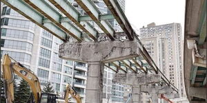 An Image of a Section of the Gardine Expressway in Canada Being Demolished