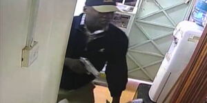 An armed robber captured on CCTV.