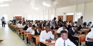 An image of Teachers in a classroom with students in a secondary school