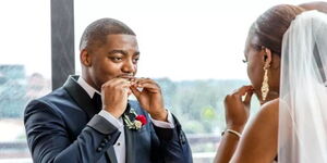 An image of a black couple during their wedding.