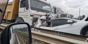 An image of a truck and a wrecked personal vehicle involved in a road accident at Githurai Flyover, Thika Road on July 15,2021