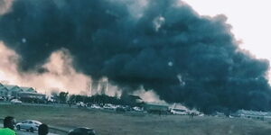 An image of dark clouds of smoke emanating from the burning godown alog m=Mombasa Road on Sunday, February 6