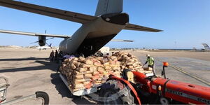 An image of food donations being offloaded from the KDF plane dispatched to deliver relief to Somalia at the Aden Abdulle airport in Somalia on Thursday, November 3, 2022.