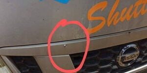 An image of one of the bullet holes on the 14-seater-van that was sprayed by bullets on Thursday March 17, 2022.