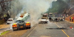 An image of several vehicles burned after a truck ferrying gas cylinders caught fire along the Mai Mahiu Road on Sunday, February 13, 2022.