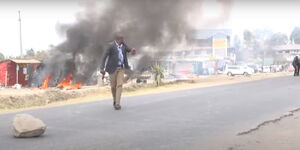 An officer along Kangundo Road during protests on Wednesday, August 20, 2020.